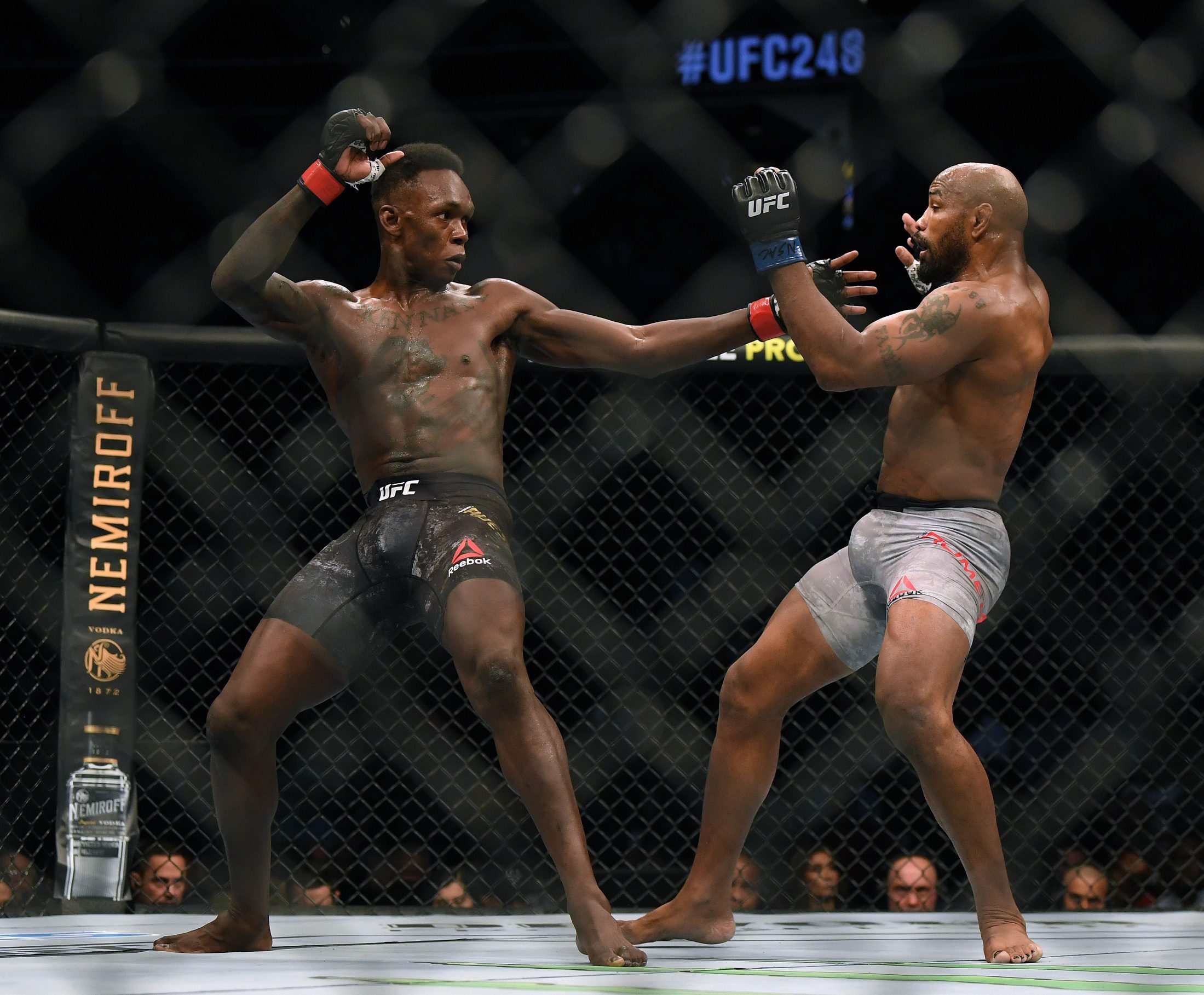 LAS VEGAS, NEVADA - MARCH 07: Israel Adesanya reacts to a punch from Yoel Romero in a Adesanya decision win to retain the middleweight title at T-Mobile Arena on March 07, 2020 in Las Vegas, Nevada.   Harry How/Getty Images/AFP
== FOR NEWSPAPERS, INTERNET, TELCOS & TELEVISION USE ONLY ==